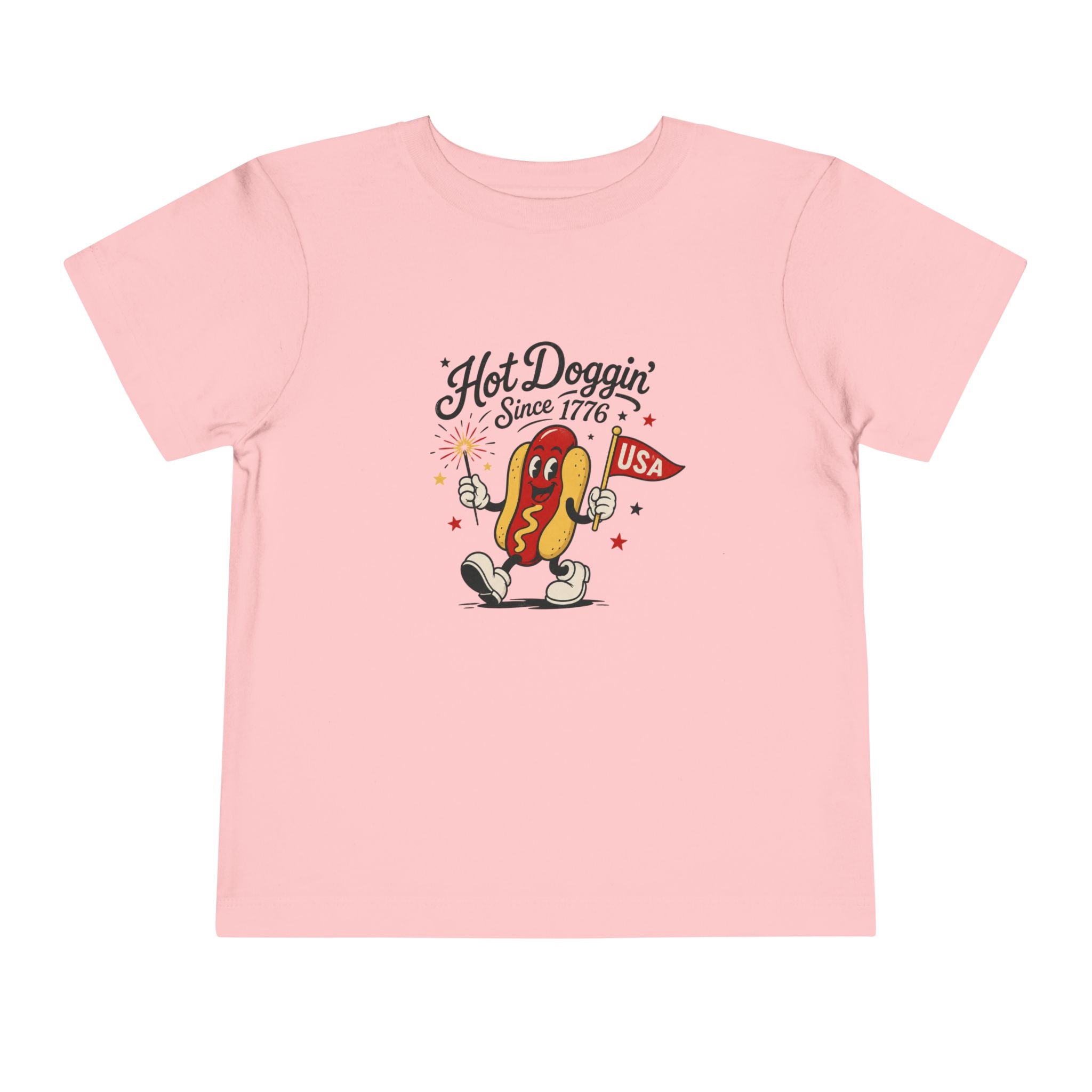 Hot Doggin Since 1776 Tee, Patriotic USA Hot Dog Shirt, Funny Summer Cartoon Graphic Top, Fourth of July Celebration Outfit Toddler Short Sleeve Tee