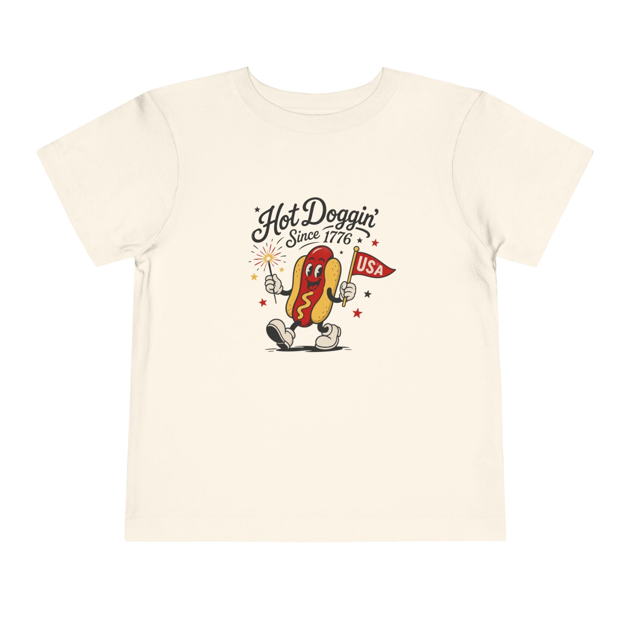 Hot Doggin Since 1776 Tee, Patriotic USA Hot Dog Shirt, Funny Summer Cartoon Graphic Top, Fourth of July Celebration Outfit Toddler Short Sleeve Tee