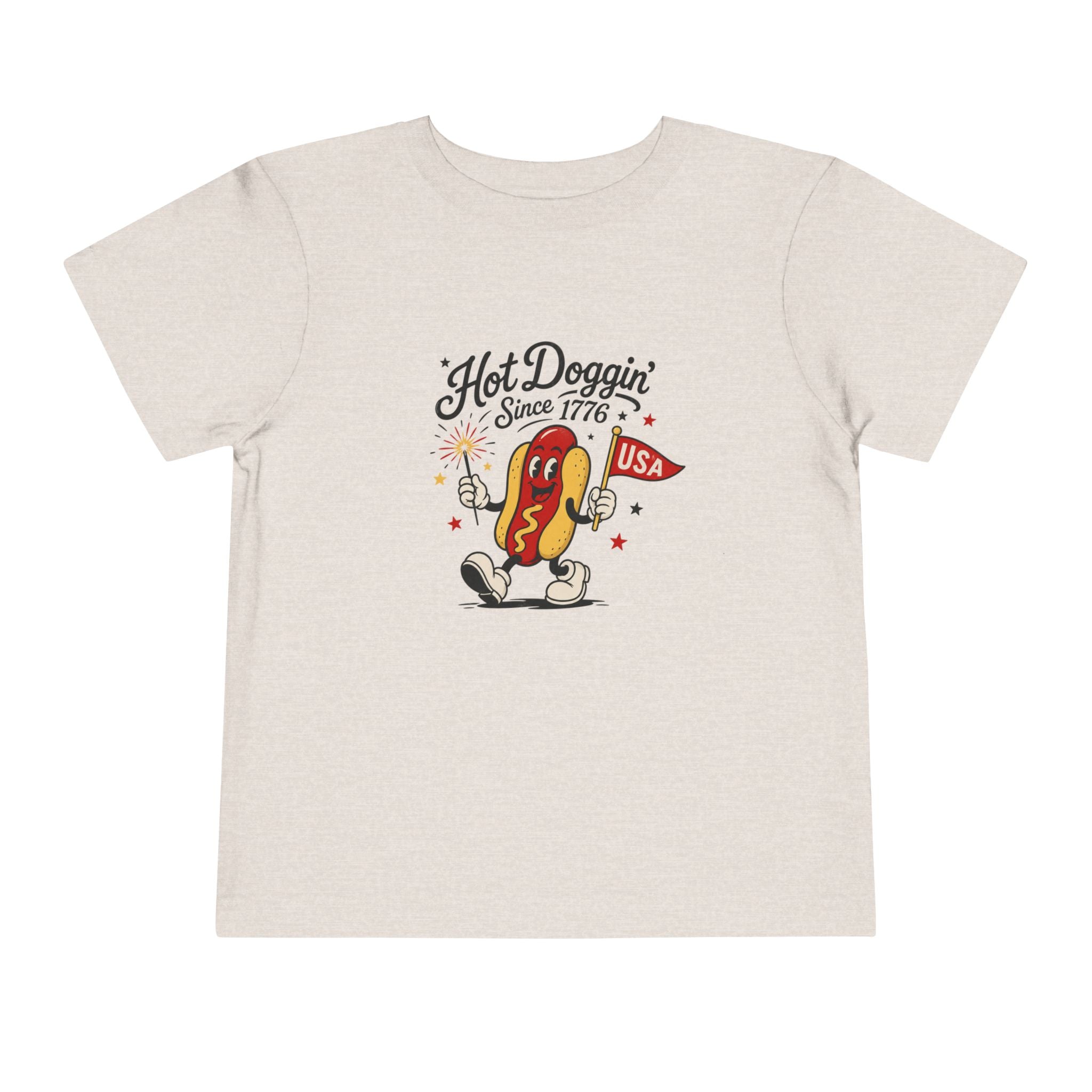 Hot Doggin Since 1776 Tee, Patriotic USA Hot Dog Shirt, Funny Summer Cartoon Graphic Top, Fourth of July Celebration Outfit Toddler Short Sleeve Tee