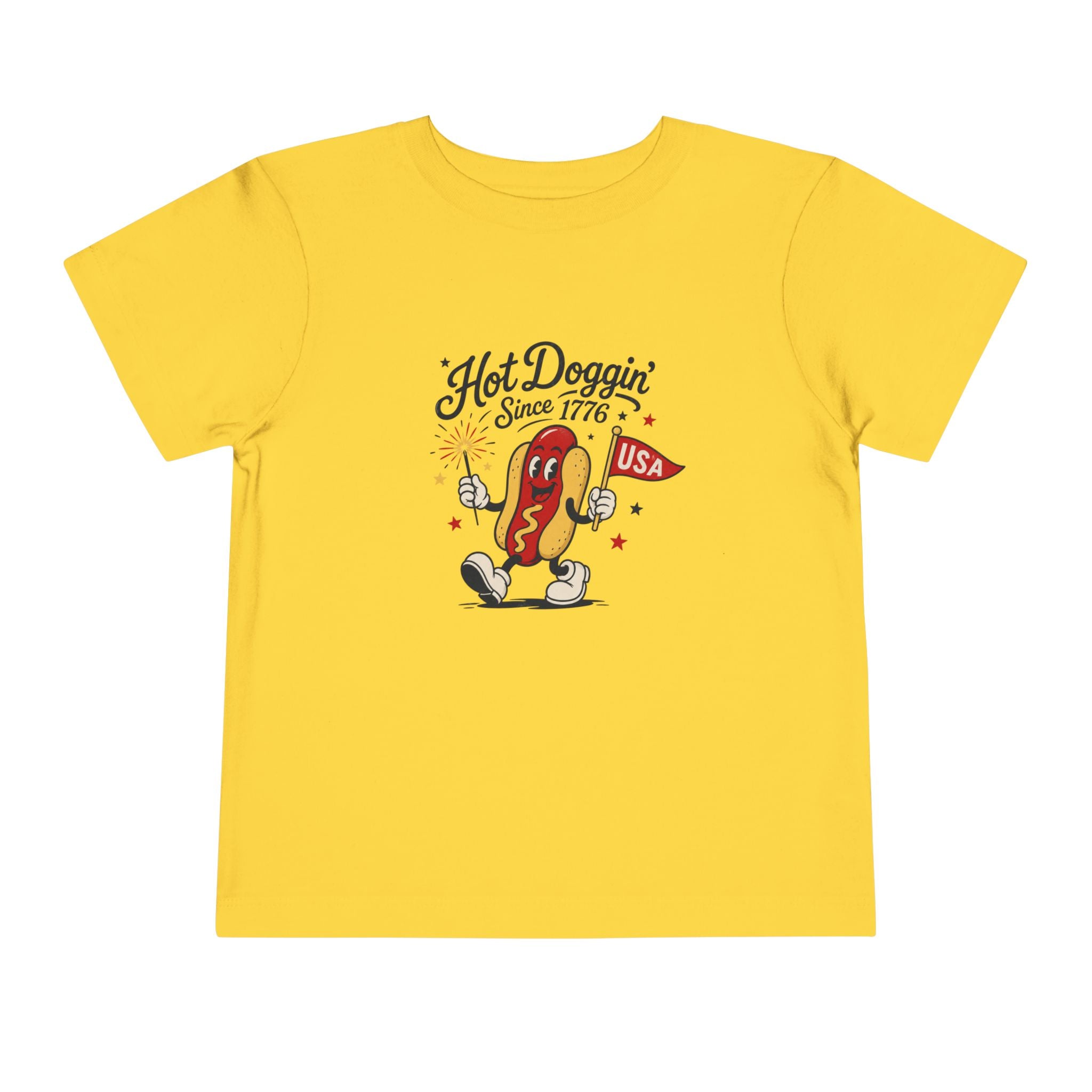 Hot Doggin Since 1776 Tee, Patriotic USA Hot Dog Shirt, Funny Summer Cartoon Graphic Top, Fourth of July Celebration Outfit Toddler Short Sleeve Tee